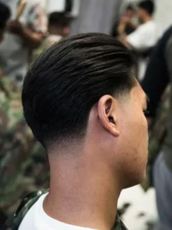 Slick back with a low taper